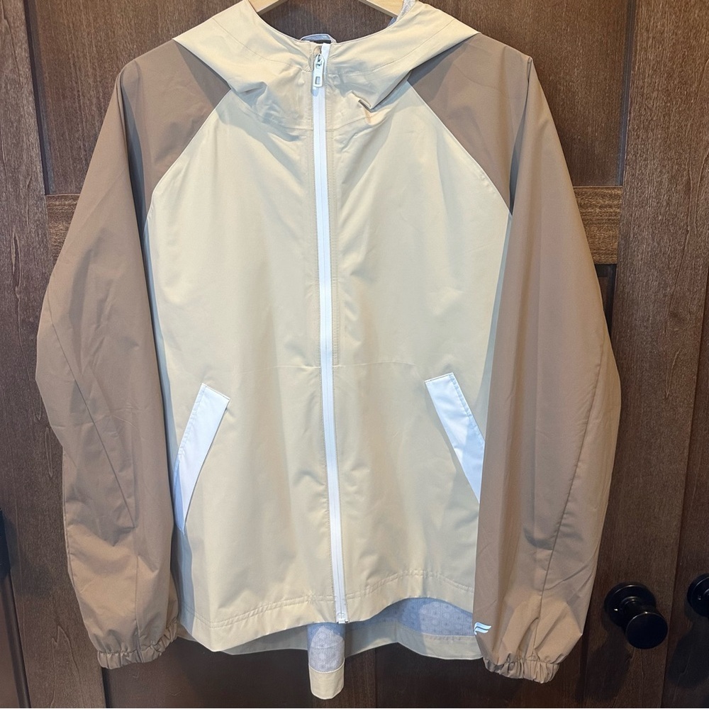 Fabletics Downpour Rain Jacket in Beige and Cream